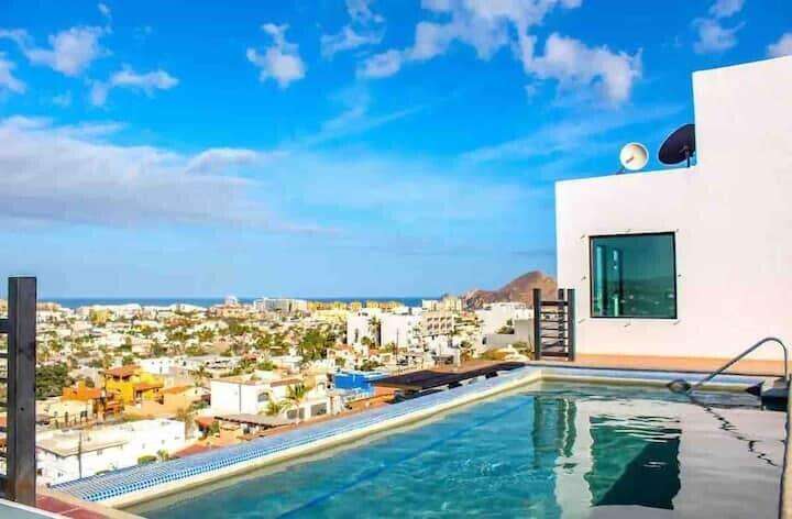 Los Cabos Centro Welcome to Morgan Residences, just a 10-minute walk to the beach in lively Marina. This 3-bedroom penthouse offers an incredible opportunity for flexible living and income generation. The spacious layout can easily convert into a 2-bedroom plus studio or a 1-bedroom with two studios, maximizing rental potential. Enjoy a huge terrace for entertaining, with city and ocean for sale