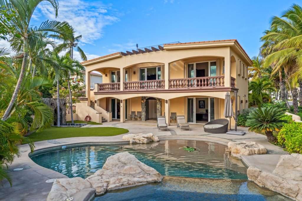 Los Cabos Blue Moon Located in the prestigious gated community of Pedregal, Villa De La Luz offers timeless Mexican Hacienda architecture combined with spacious living and exceptional comfort.This beautifully designed residence features expansive indoor and outdoor areas, ideal for both full-time living and entertaining. Bright interiors flow seamlessly to generous terraces, creating the perfect setting to enjoy Cabo's lifestyle.The home offers 6 en-suite bedrooms, a fully equipped kitchen, and thoughtfully designed living spaces. Outdoor amenities include a private swimming pool, jacuzzi, and BBQ area, providing an ideal environment for relaxation and gatherings.Include a two-car garage, ample storage, and access to Pedregal's exclusive amenities, including 24/7 security, beach and green areas. – 2 Punta Gorda, San Jose del Cabo, BS