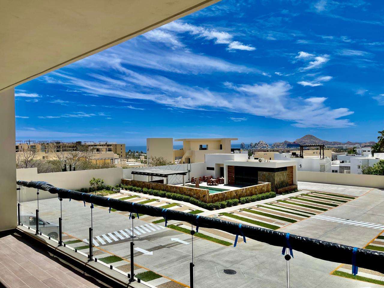 Los Cabos Brisas Del Tezal Ready for delivery! Brisas del Tezal second-floor condo featuring 2 bedrooms and 2 bathrooms in an exclusive low-density community of 36 units across two 4-story elevator buildings. Located minutes from Medano Beach and downtown Cabo. Showcases excellent construction quality and craftsmanship from the developer, including parota wood carpentry and a large, solid front door. Features large-format tile flooring throughout, spacious balcony, granite countertops and backsplash in the kitchen, bathrooms with marble showers to the ceiling, wall-to-wall closets, and a laundry room with space for side-by-side washer and dryer, plus manual washing area and storage. Equipped with 1-ton A/C mini-splits in each bedroom and two in the living area.Enjoy ocean, city, mountain, and sunset for sale