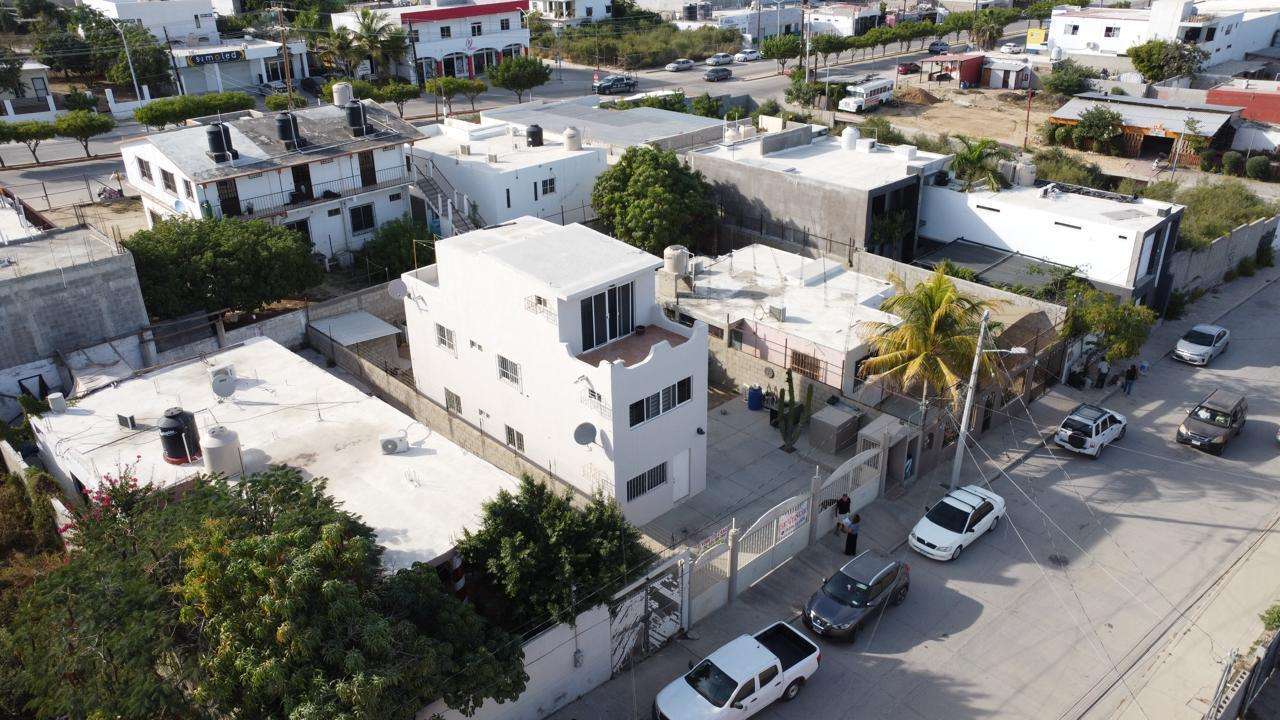 Los Cabos Santa Rosa Strategic Investment in El Zacatal: Dual-Unit Property with High ROI PotentialLocated just one block from the main Blvd. Dr. Ernesto Chánez Chávez, this property is a prime opportunity in one of San José del Cabo's high-demand rental markets. The building features two independent, spacious units designed for modern living.Unit A (2 Bedrooms): A generous layout ideal for small families or professionals. It features a full kitchen with a functional breakfast bar and a complete bathroom.Unit B (1 Bedroom): A cozy, efficient unit perfect for couples or individuals. Includes a kitchen with a built-in bar and a full bathroom. for sale