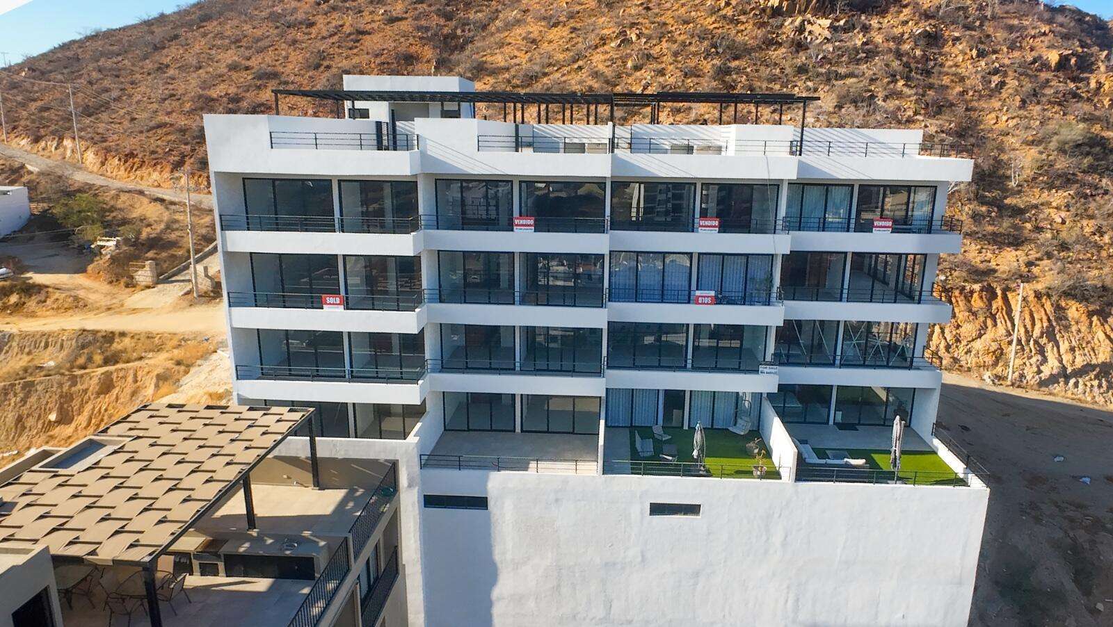 Los Cabos Breeze Of Cabo Discover the charm of Ground Floor Unit #102 at Breeze of Cabo, located in the sought-after Sunset area of Cabo San Lucas. This modern 2-bedroom, 2-bathroom condo features a spacious private patio — perfect for enjoying the warm weather and outdoor living. , the unit includes underground parking and access to a shared rooftop with a swimming pool and panoramic ocean for sale