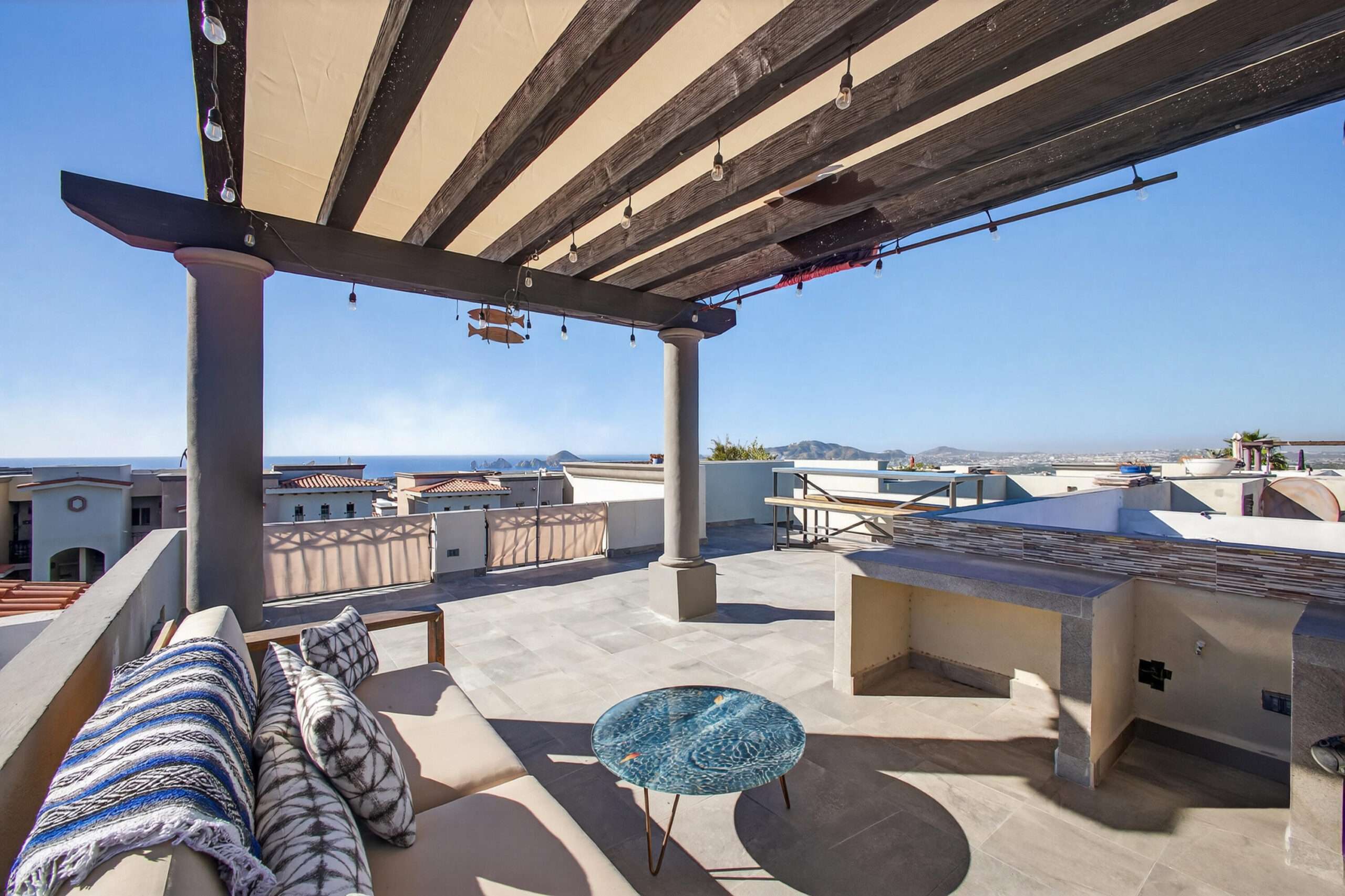 Los Cabos Ventanas Charming Penthouse located within the community of Ventanas del Cortés, situated in El Tezal, Cabo San Lucas. This 2-bedroom, 2-bath condo offers a rooftop with incredible for sale