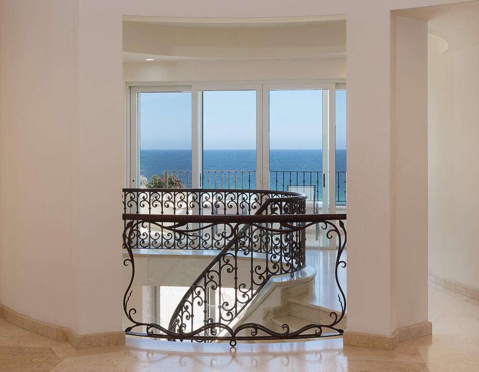 Los Cabos Blue Moon Located in the prestigious gated community of Pedregal, Villa De La Luz offers timeless Mexican Hacienda architecture combined with spacious living and exceptional comfort.This beautifully designed residence features expansive indoor and outdoor areas, ideal for both full-time living and entertaining. Bright interiors flow seamlessly to generous terraces, creating the perfect setting to enjoy Cabo's lifestyle.The home offers 6 en-suite bedrooms, a fully equipped kitchen, and thoughtfully designed living spaces. Outdoor amenities include a private swimming pool, jacuzzi, and BBQ area, providing an ideal environment for relaxation and gatherings.Include a two-car garage, ample storage, and access to Pedregal's exclusive amenities, including 24/7 security, beach and green areas. – Casa Edwards Too, San Jose Corridor, San Jose Corridor, BS