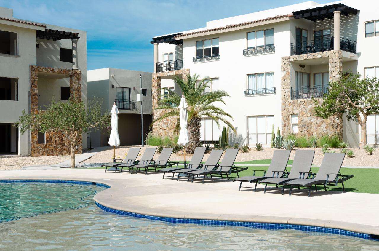 Los Cabos Camino Del Mar Condo for sale in Camino del Mar, La Joya, Cabo San Lucas. This 2-bedroom, 2-bathroom condo is located on the ground level, offering easy access and comfortable living. The unit features a private terrace with a pleasant for sale