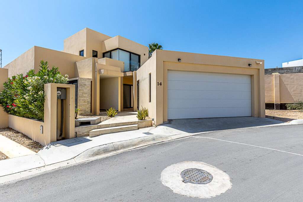 Los Cabos Cabo Del Mar Ecopark This Cabo del Sol Model (largest) situated in Cabo del Mar showcases a variety of premium upgrades. Featuring high-end stainless steel appliances, new flooring, enclosed garage and stylish Mexican contemporary accents, this home also includes a maid's quarters for added convenience. Its proximity to shopping and downtown Cabo makes it an ideal choice for those seeking a sophisticated lifestyle. Perfect for rooftop gatherings, the residence is just a stone's throw away from the community pool. For more information or to schedule a for sale