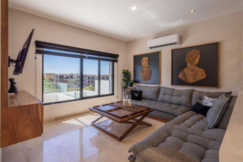 Los Cabos Cumbre Del Tezal Tastefully decorated home in a peaceful, family-friendly community. The open living and kitchen areas provide a cozy and welcoming setting for gatherings with family and friends. It offers three bedrooms with ensuite baths and beautiful custom carpentry, plus a rooftop terrace with ocean for sale