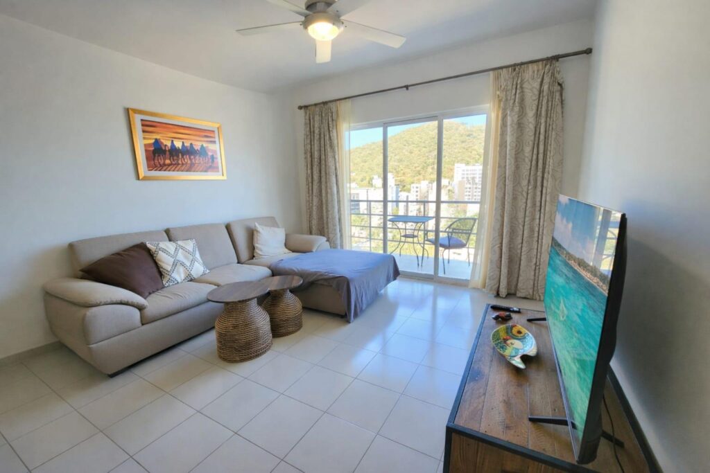 Los Cabos Fracc Lomas Del Cabo Practical and well-located 2-bedroom, 1-bath condo in Cabo San Lucas, just minutes from downtown and near the Cerro de la Z area. This unit features a functional layout suited for full-time living or rental purposes, with convenient access to shops, services, and main roads while remaining in a quiet residential setting. Located on the second floor, it offers direct access from the parking area with no stairs, a useful advantage compared to similar properties. The condo includes all appliances, some furniture, hurricane-shutter adaptations, and a functioning security camera and alarm system. Its location, low maintenance, and overall readiness make it appealing for both short- and long-term rental strategies or for buyers seeking a practical property in Cabo. Price: – Del Aguila, Cabo San Lucas, BS