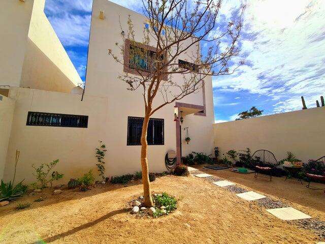 Los Cabos Csl N-E Of19:Genral GREAT INVESTMENT OPPORTUNITY - ENDLESS POSSIBILITIES!Discover the untapped potential of Casa Altezza, a spacious single-family home nestled in a sought-after residential community in northern Cabo San Lucas, conveniently located off Highway 19 and Tamaral Ave. What sets this property apart? THE LARGEST LOT! in its phase, offering unique development potential! Expand the current home, add residential rental-rooms, design a covered garage, or build the ultimate entertainment space with seamless access--this property's extra land is a blank canvas for creativity and investment. Completed in April 2022, Casa Altezza features 3 bedrooms and 2.5 bathrooms, including an ensuite bath in the master bedroom. The home boasts a spacious front patio with mature plants and trees, along with a private back patio with partial concrete flooring.Several thoughtful upgrades include: - Custom-designed kitchen with a modern, minimalist concept and an expanded window for ample natural light. - Enclosed bonus room for laundry and storage. - High 2.5-meter privacy walls surrounding the property. - Iron-protected doors and windows with installed screens. - Abundant water supply with a total of 23,700 liters, including two cisterns and a rooftop water tank. - New appliances, including a full-size washer & dryer, stove, hood, refrigerator, two inverter mini-splits, and ceiling fans.Casa Altezza sits in an ideal location, just 10 minutes from downtown Cabo San Lucas, Medano Beach, Puerto Paraiso Mall, and The Marina. Daily conveniences like supermarkets, shopping centers, medical facilities, and schools are just minutes away. Plus, the community is a gated neighborhood with electronic access, and a remarkably low HOA monthly fee of only for sale