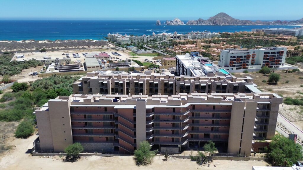 Los Cabos Las Arenas Best priced, 2 bed fully furnished condo in Las Arenas!! This property is ideally located just five minutes from the famous Medano Beach and offers convenient access to a wide selection of restaurants, supermarkets, and the Marina.The building features an impressive suite of amenities designed for comfort and relaxation, including two large swimming pools (one is semi-olympic size), firepit, large jacuzzi, and spacious lounging areas. Residents also have access to an on-site spa with a sauna and a fully equipped gym. – Las Arenas, Cabo Corridor, Cabo Corridor, BS