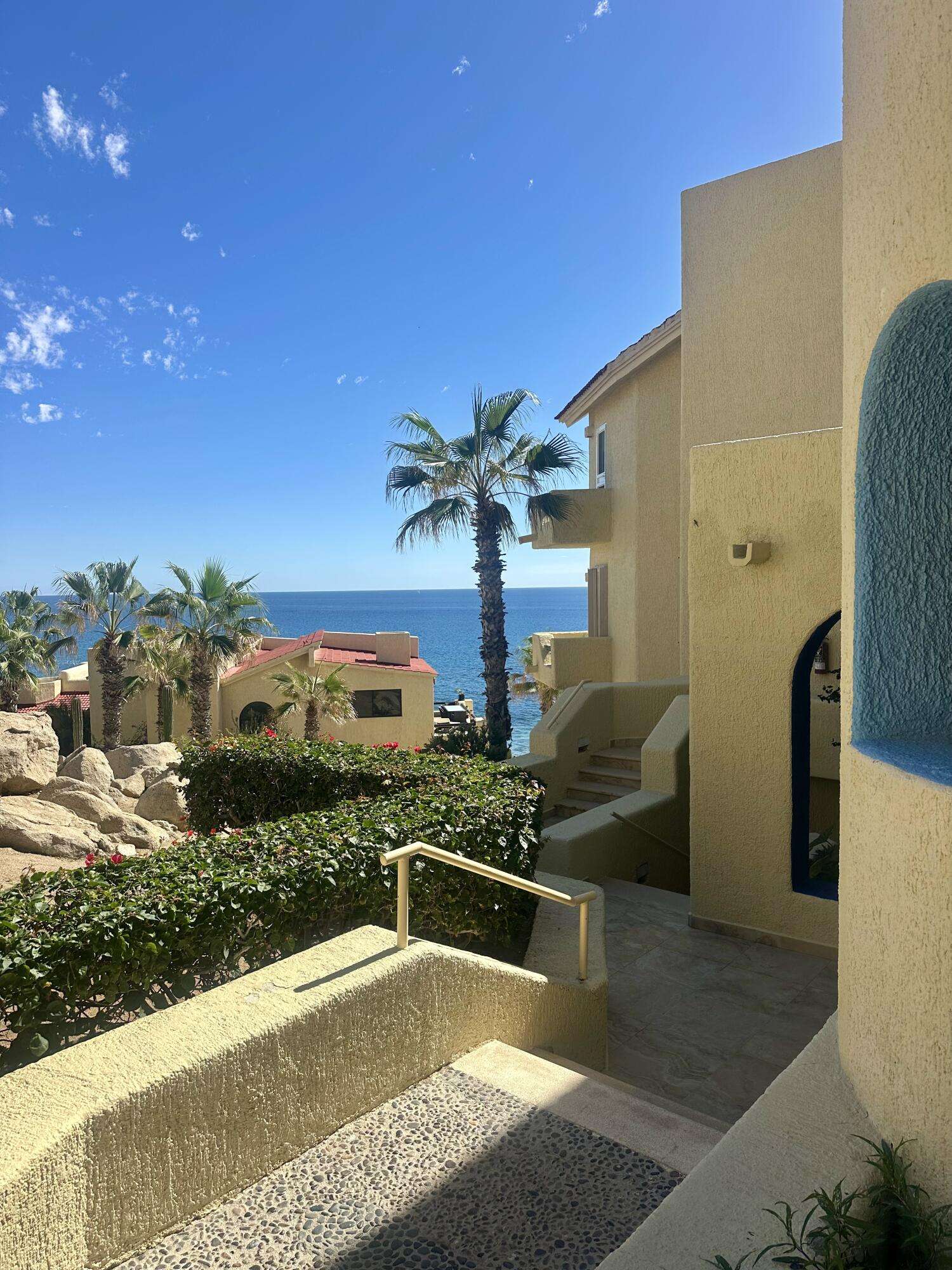 Los Cabos Misiones Del Cabo Experience coastal living at its finest in this stunning beachfront community. Just steps from the shoreline, residents enjoy access to a private beach cove, perfect for sunbathing, snorkeling, or exercising in a serene and private setting. The community offers resort-style amenities, including a swim-up bar, pool,and an on-site restaurant, all nestled within lush, tropical gardens. As you arrive at the condo, you are welcomed by sweeping ocean for sale