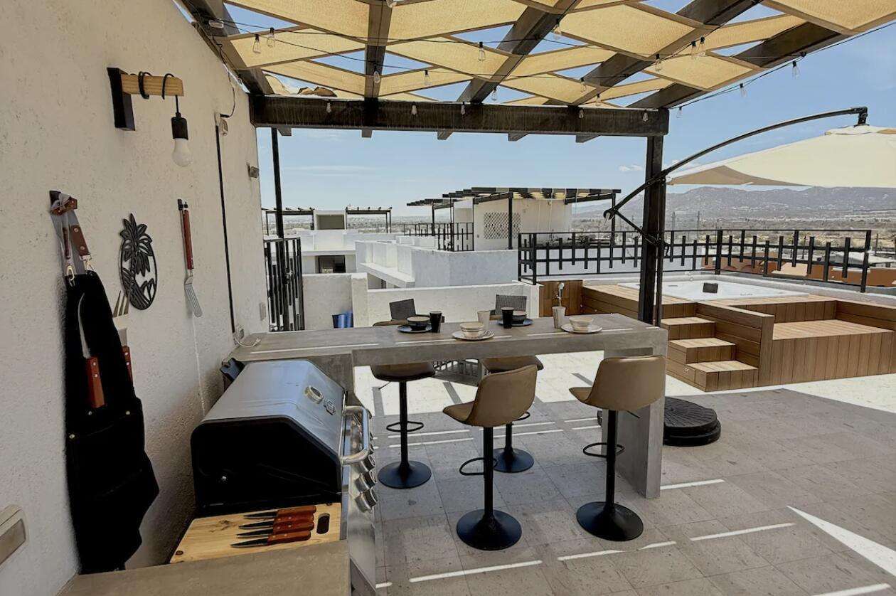 Los Cabos Coromuel Introducing the crown jewel of Vento Coromuel: a boutique 2BR/1BA PH condo in the heart of downtown Cabo, just steps from Medano Beach, the marina, and the city's vibrant energy. This turn-key unit offers incredible rental potential in an area with consistently high demand thanks to its unbeatable location, security, and charming neighborhood vibe. The BEST unit in the entire development, it features private parking, tasteful modern minimalist-desert decor, and is one of only 10 units with a private rooftop—uniquely the only one with a jacuzzi, ocean for sale