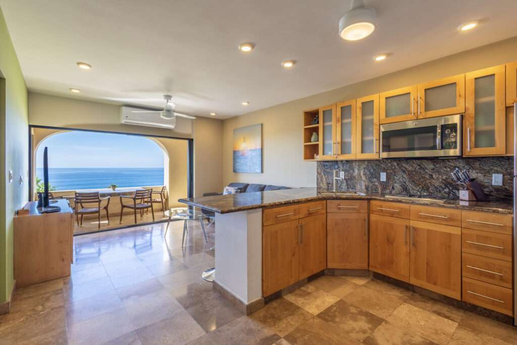 Los Cabos Turquesa Los Cabos Ground-floor condo—one of the most sought-after layouts—offers effortless access with no stairs to climb. It comes fully equipped with a modern kitchen featuring quartz countertops, refrigerator, stove, microwave, air conditioning, bedroom closets, and stylish vanities. Hurricane shutters, synthetic grass, and bedroom blinds add comfort and peace of mind. Includes two parking spaces. Enjoy resort-style amenities: pools, BBQ areas with pergolas, sun loungers, tennis and pickleball courts, playground, pet park, and 24/7 security. Located in El Tezal, one of Cabo San Lucas' most desirable and fast-growing areas, close to services, shopping, and dining—an excellent opportunity for lifestyle and long-term value. – Plaza Calafia, Cabo Corridor, Cabo Corridor, BS